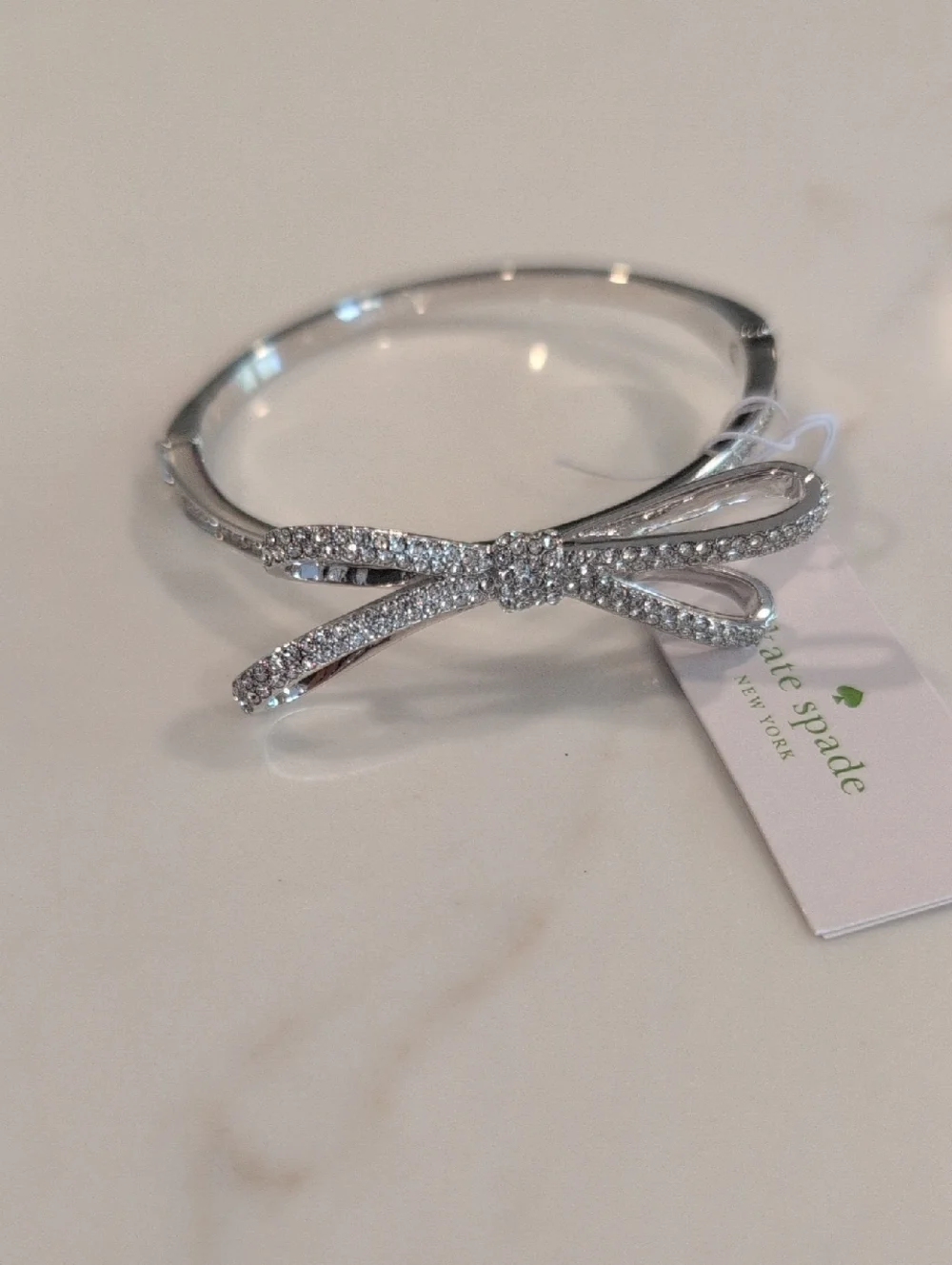 Kate Spade Silver And Crystal Bow Bangle Bracelet. NWT - Picture 1 of 8